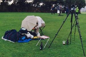Andrew packs up the gear in the rain